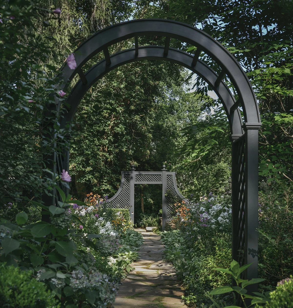 Black garden arch framing the path to the fountain, Historic Garden, Shrewsbury NJ