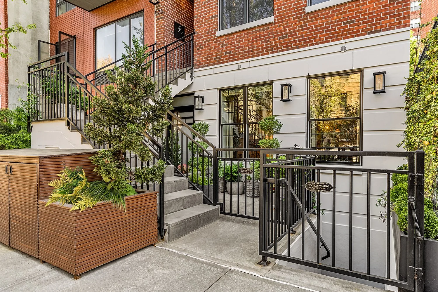 Townhouse front with timber planters, black railings and the new entrance gate, Townhouse Garden, Brooklyn