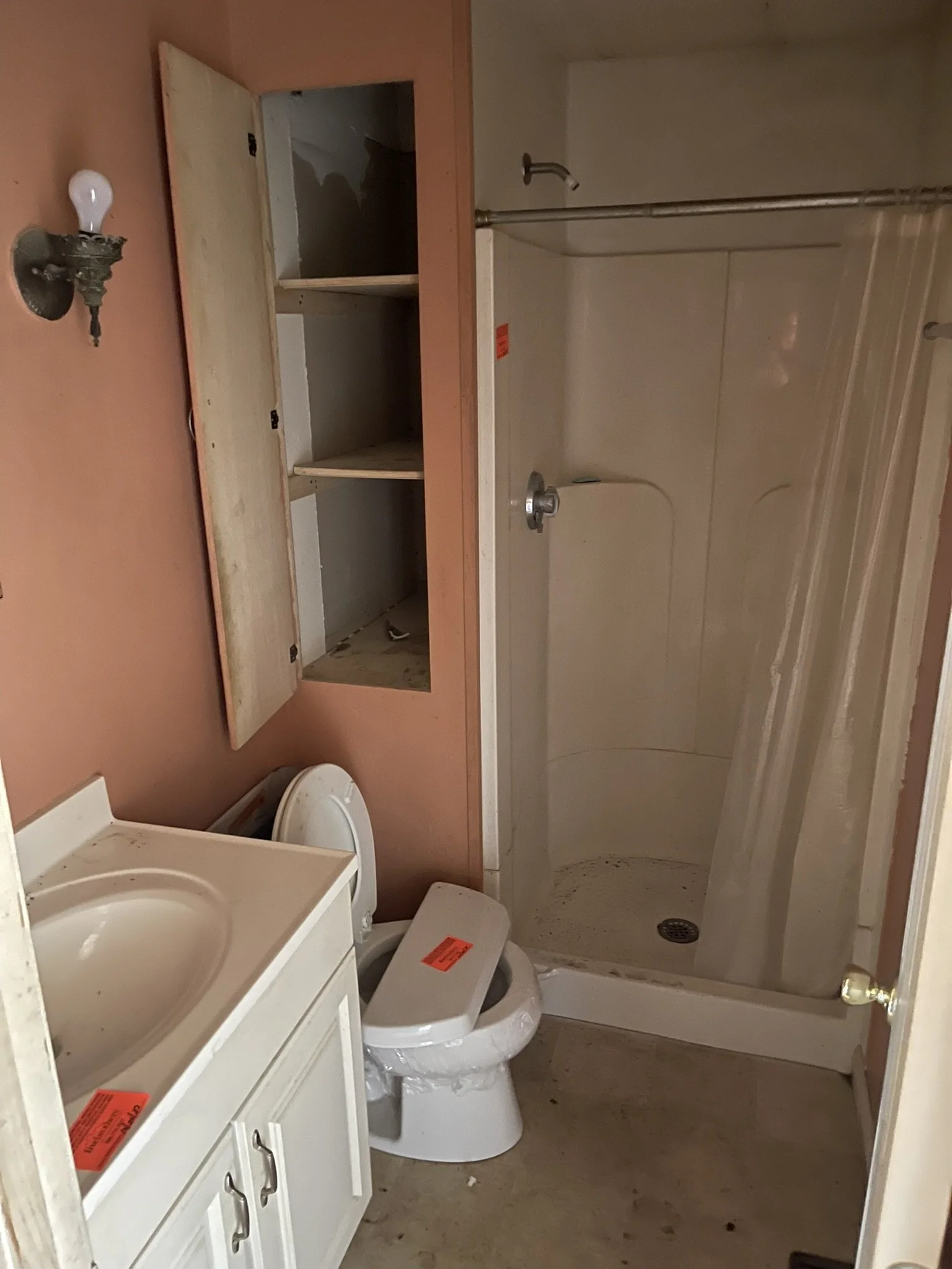 Before renovation — the original Dragon Court bathroom.