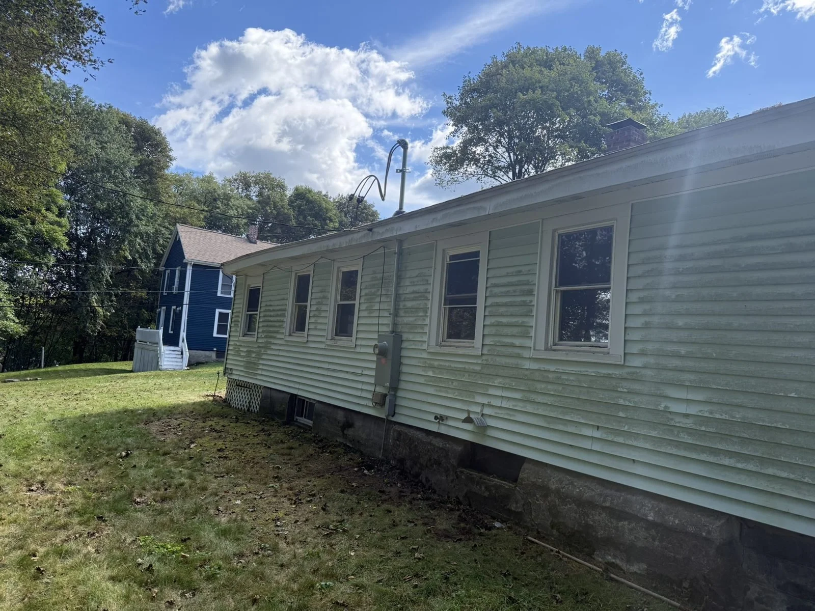 PROGRESS — Side exterior and yard — September 21, 2026
