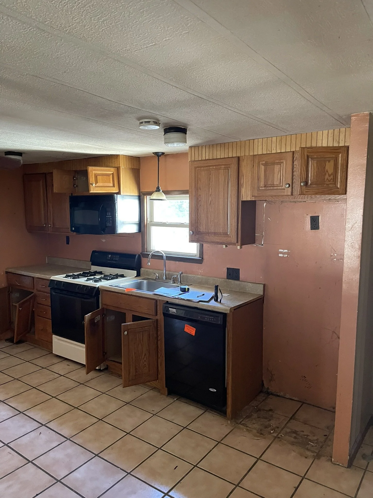 Before renovation — the original Dragon Court kitchen.