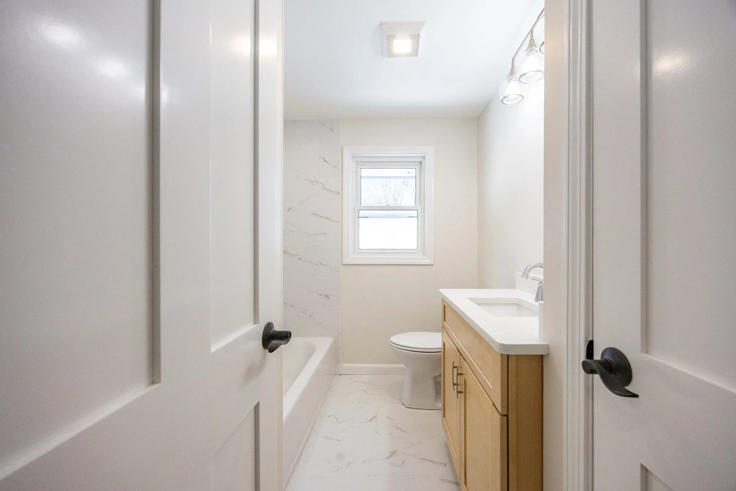 AFTER — Renovated bathroom at 14 Bradford Road.