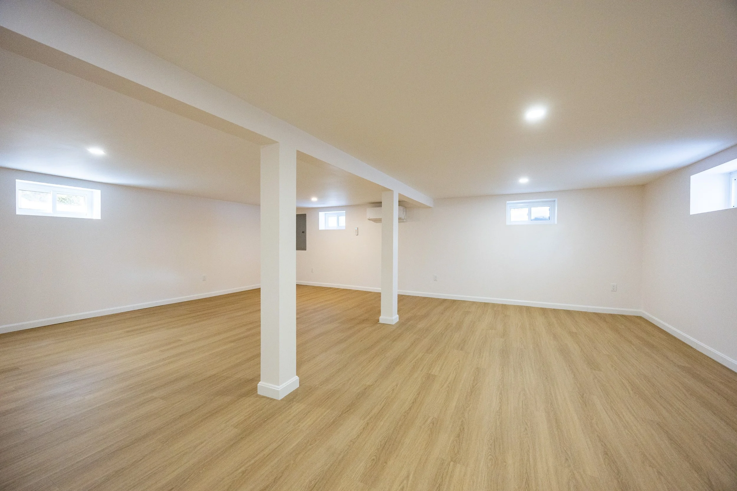 AFTER — Finished lower level at 14 Bradford Road.
