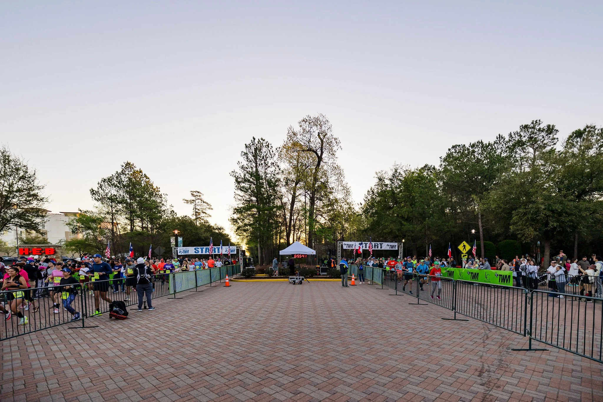 Athletes gathering at The Woodlands Marathon start line
