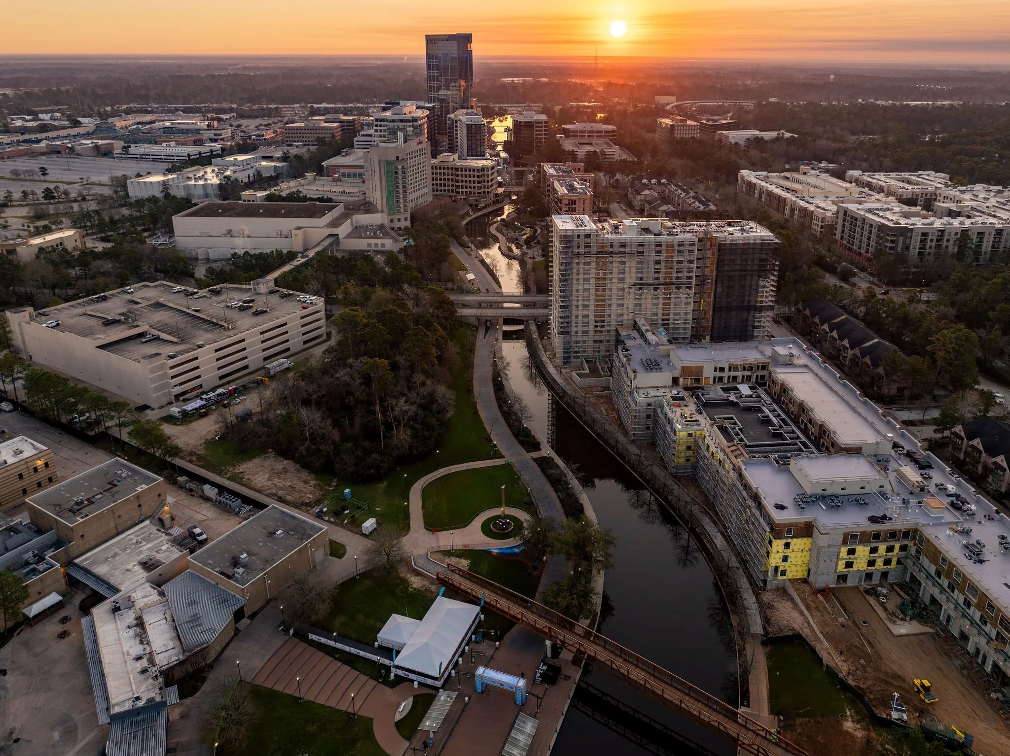 Sunset aerial view of The Woodlands Waterway district