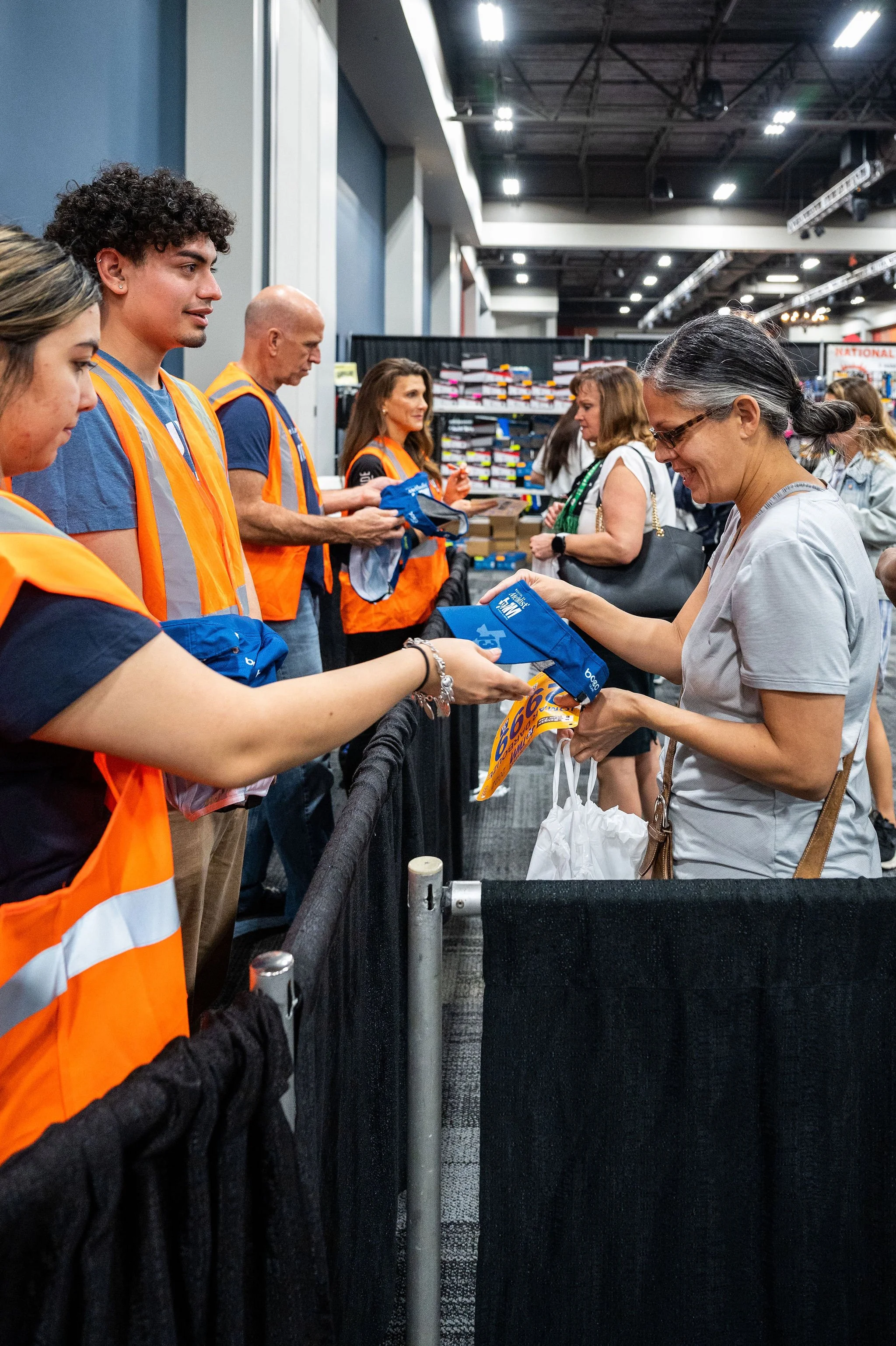A volunteer team helping runners at race pickup
