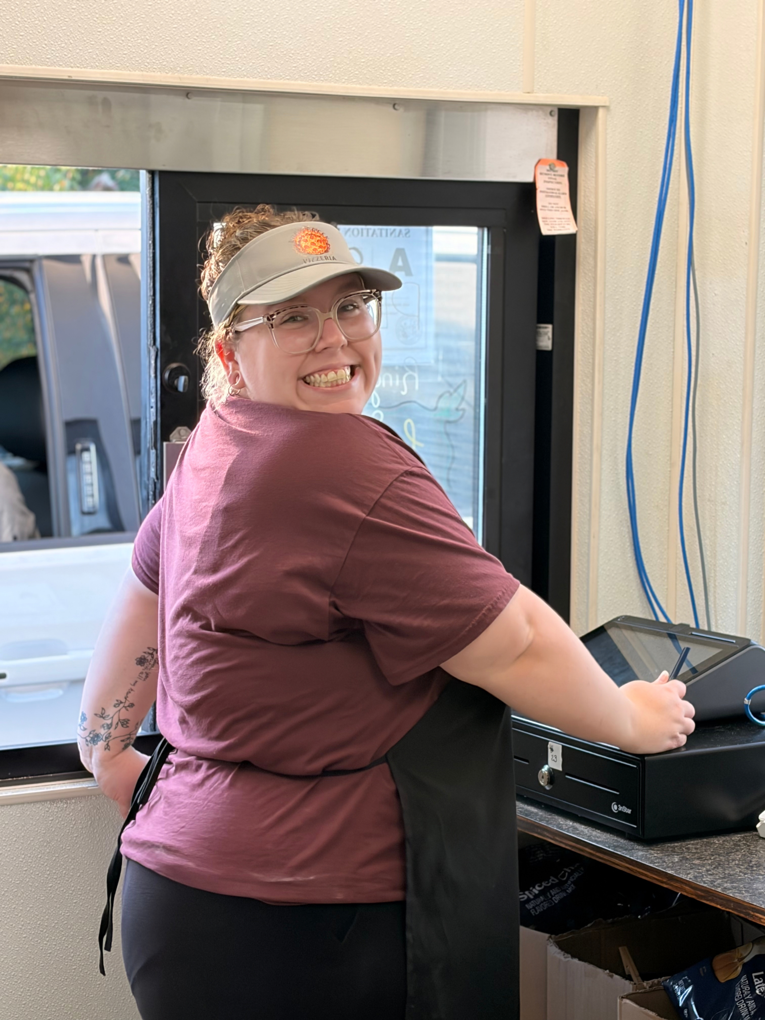 Team Member at Drive Thru  - Rock Creek Pizzeria.png