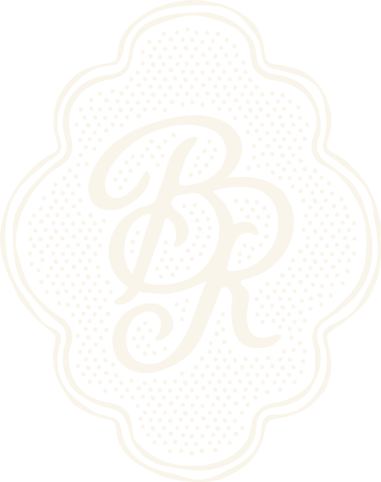 Black and white vintage-style logo with overlapping cursive letters 'B', 'D', and 'R' inside a decorative border.
