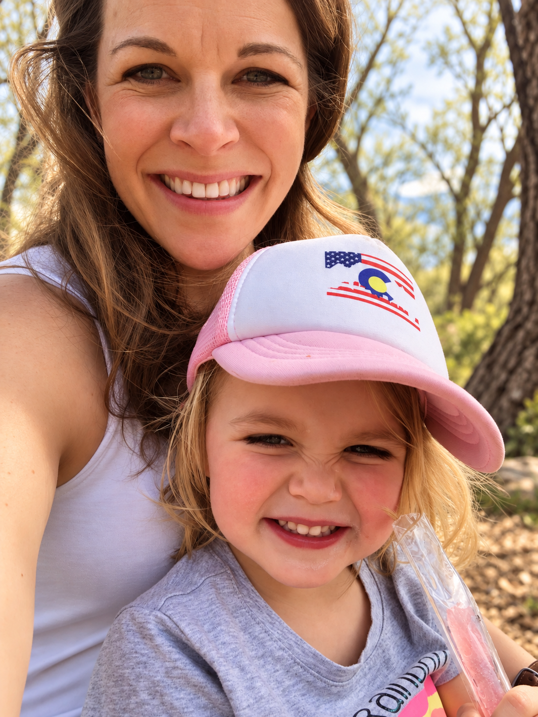Melissa with her child outdoors