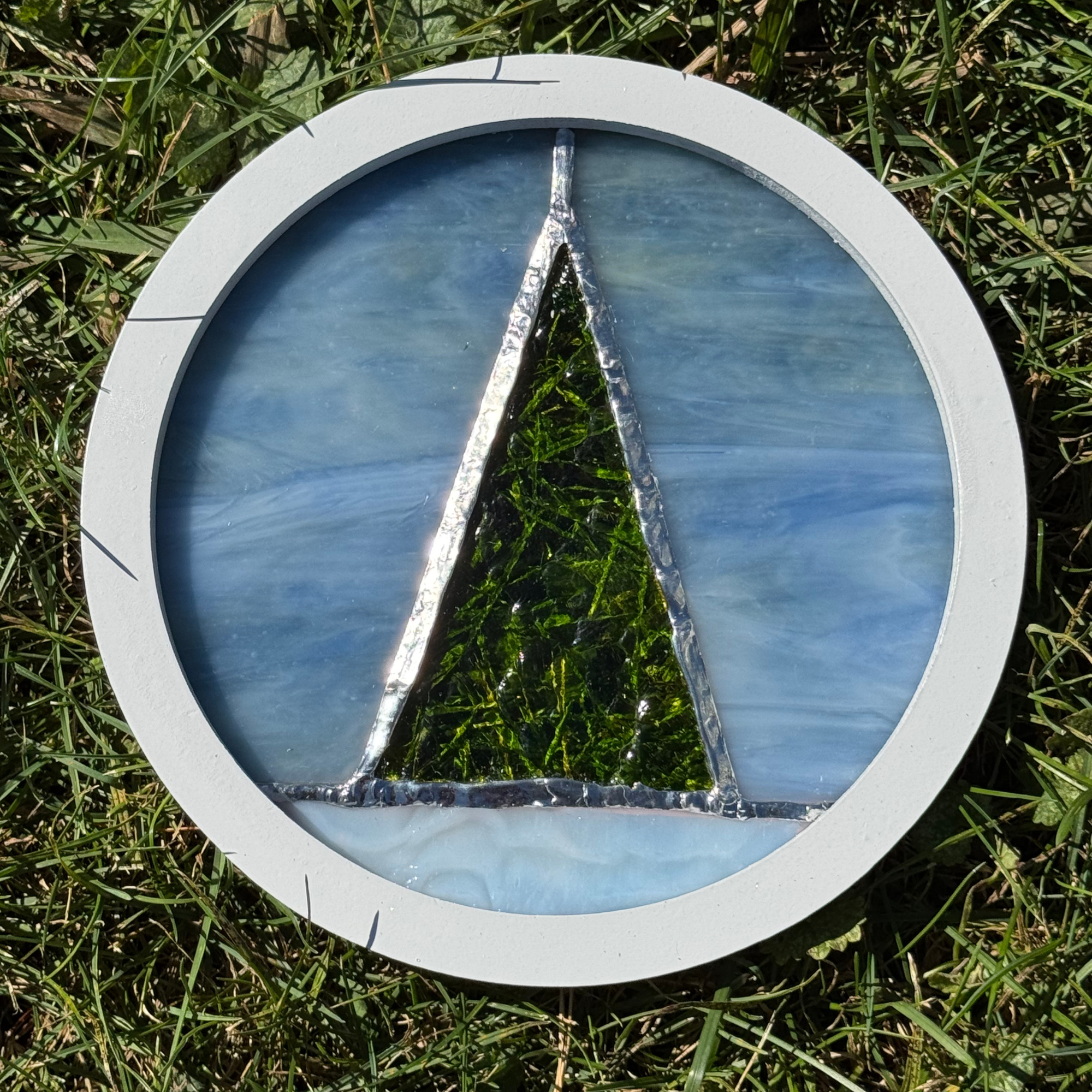 single tree flat on grass.png