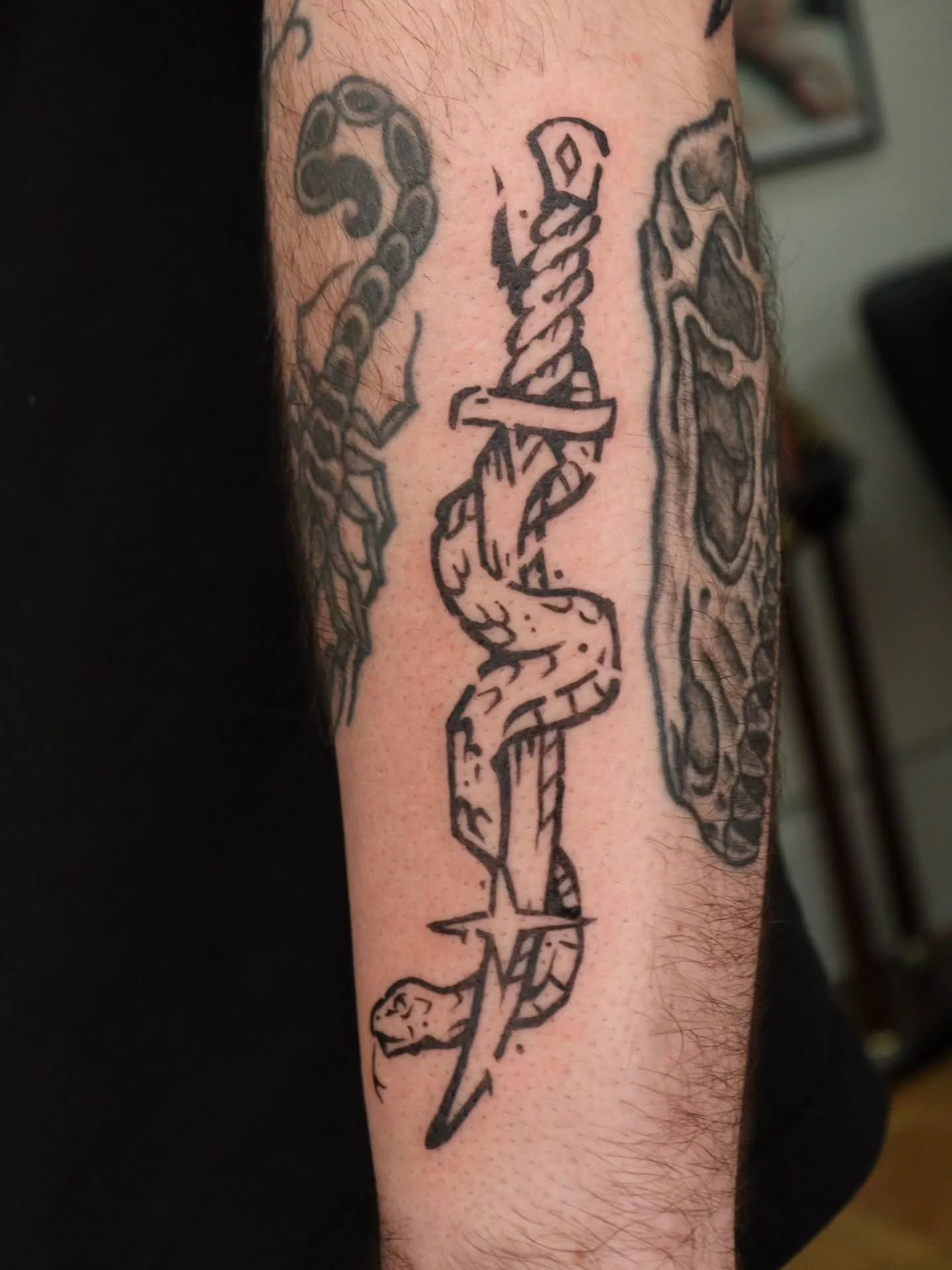 Gap filler sword and snake 🐍 
#tattoo #woodcuttattoo #nctattooers #raleightattoo #durhamtattoo