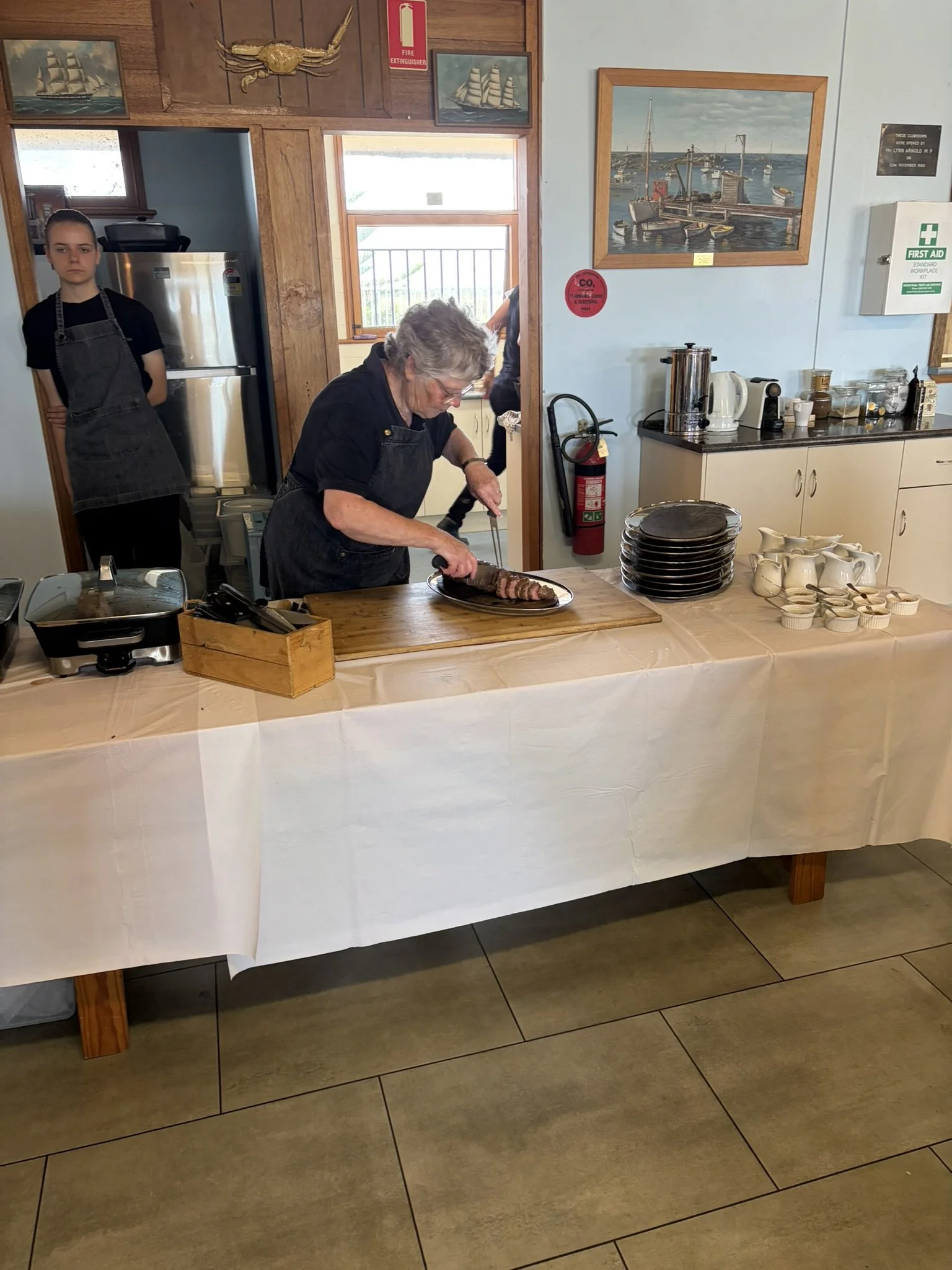 Our caterers, Filsall Foods, preparing carved beef as part of the exceptional menu for the day.