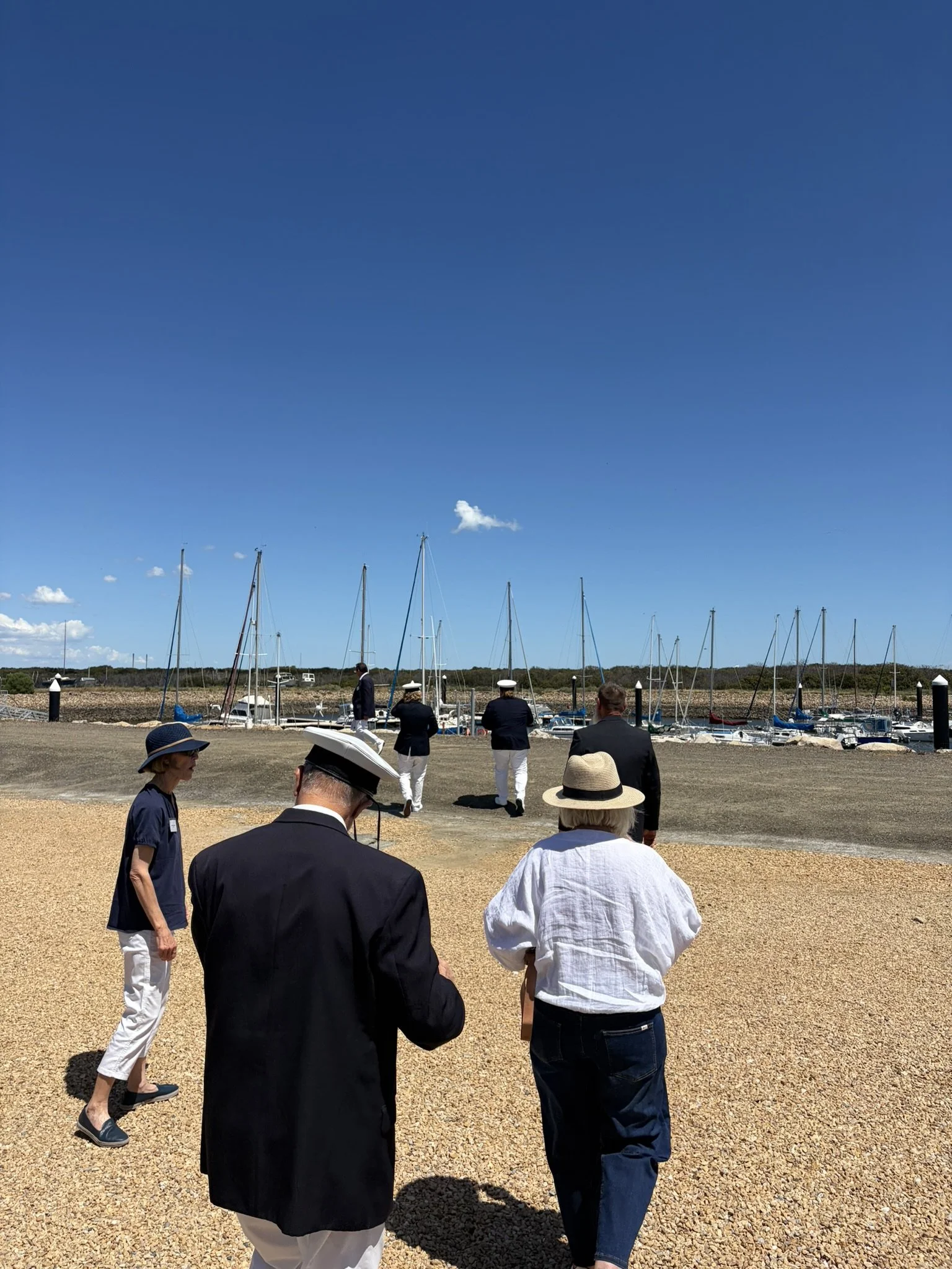 Invited guests make their way to "Duchess" - the official boast for the sail past....