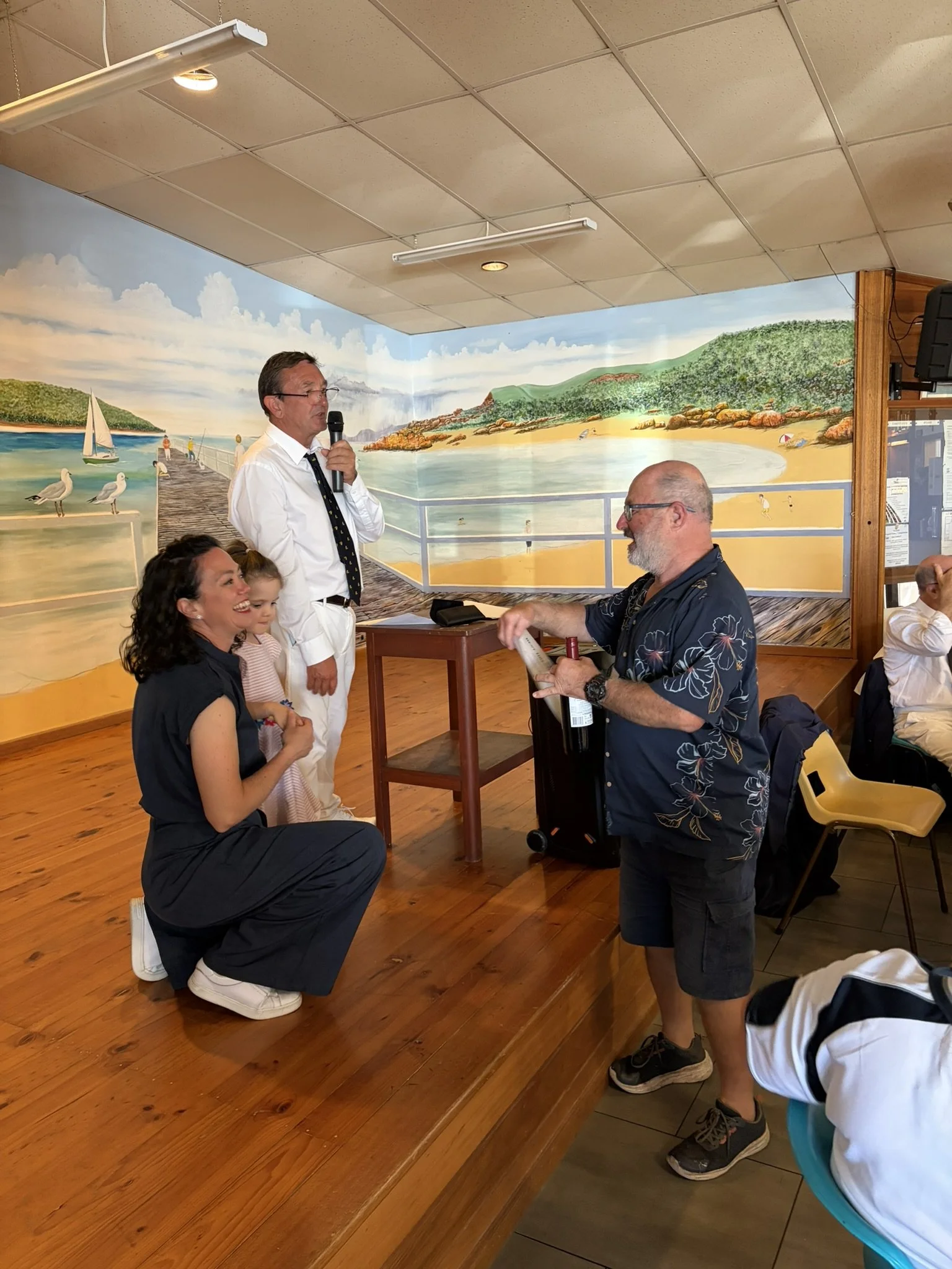 Ian Cope receiving his award for "Best Dressed" boat - a lovely bottle of red and his certificate.  Well done, Ian.