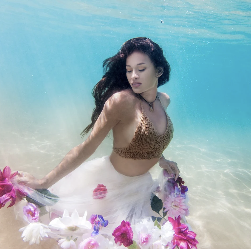 I am rooted, but I flow.” — Virginia Woolf

Alohi reflects the quiet radiance that emerges when we feel deeply rooted in ourselves and connected to nature. Like the ocean's tides, she reminds us that serenity is not found in standing still, but in mo