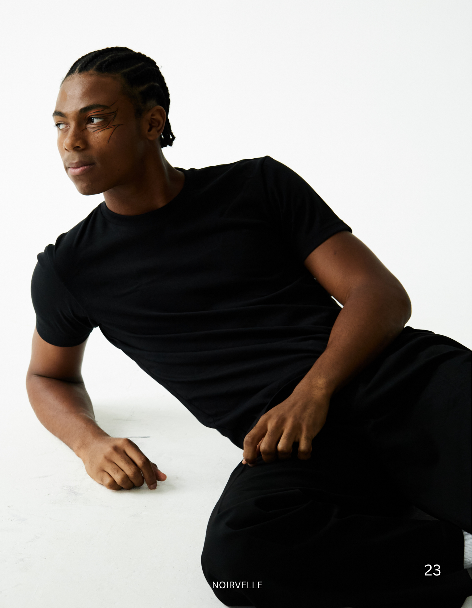 Studio portrait of male model with braids in black T-shirt – Noirvellel

