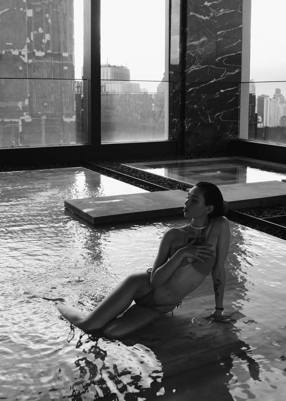 Editorial fashion model in a cinematic pool photoshoot – Noirvellel