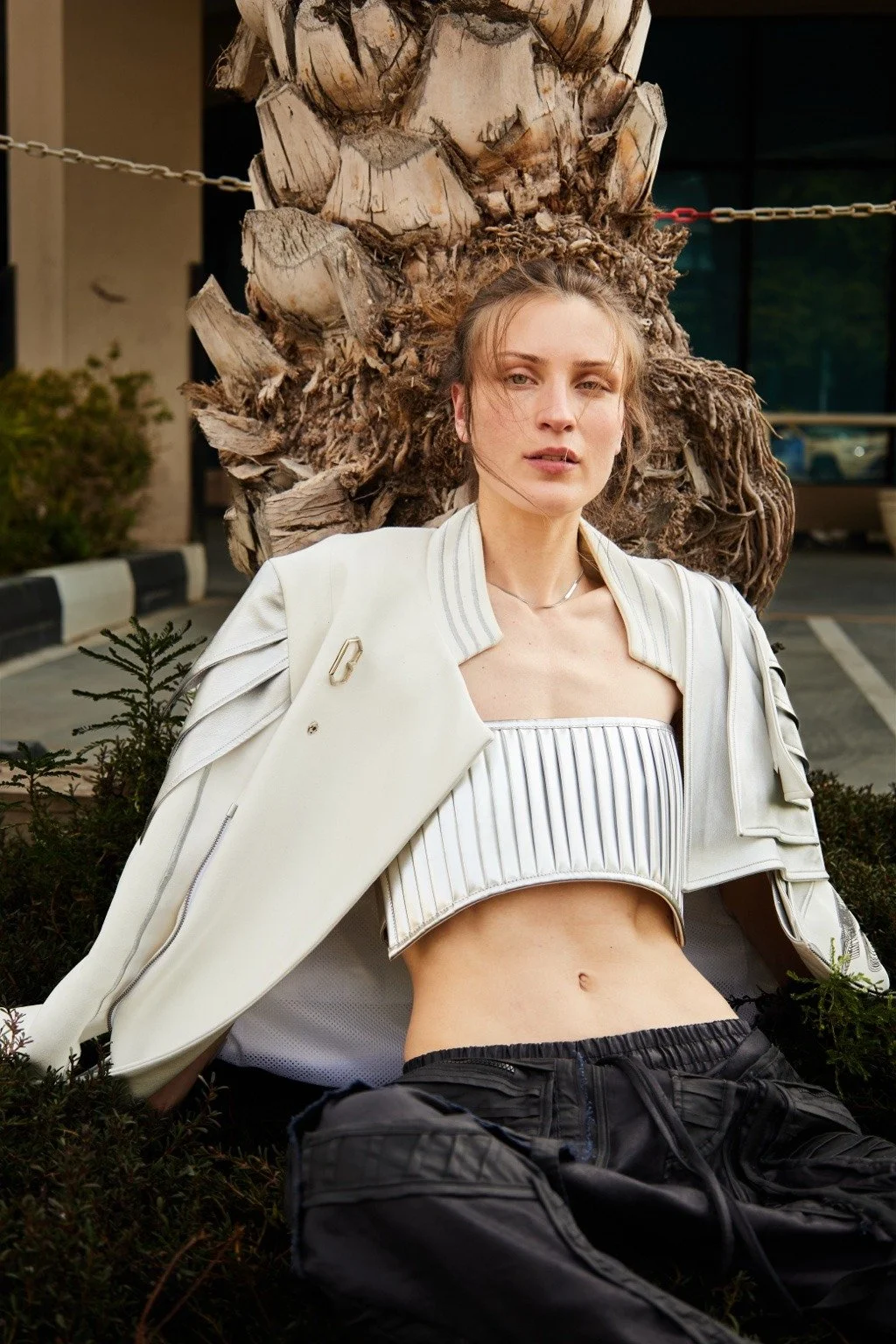 Fashion editorial featuring a female and male model in an elegant evening setting, photographed by Noirvellel.