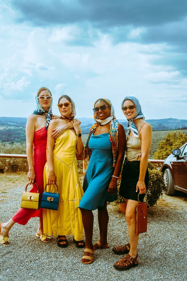 Close friends at a winery in Tuscany