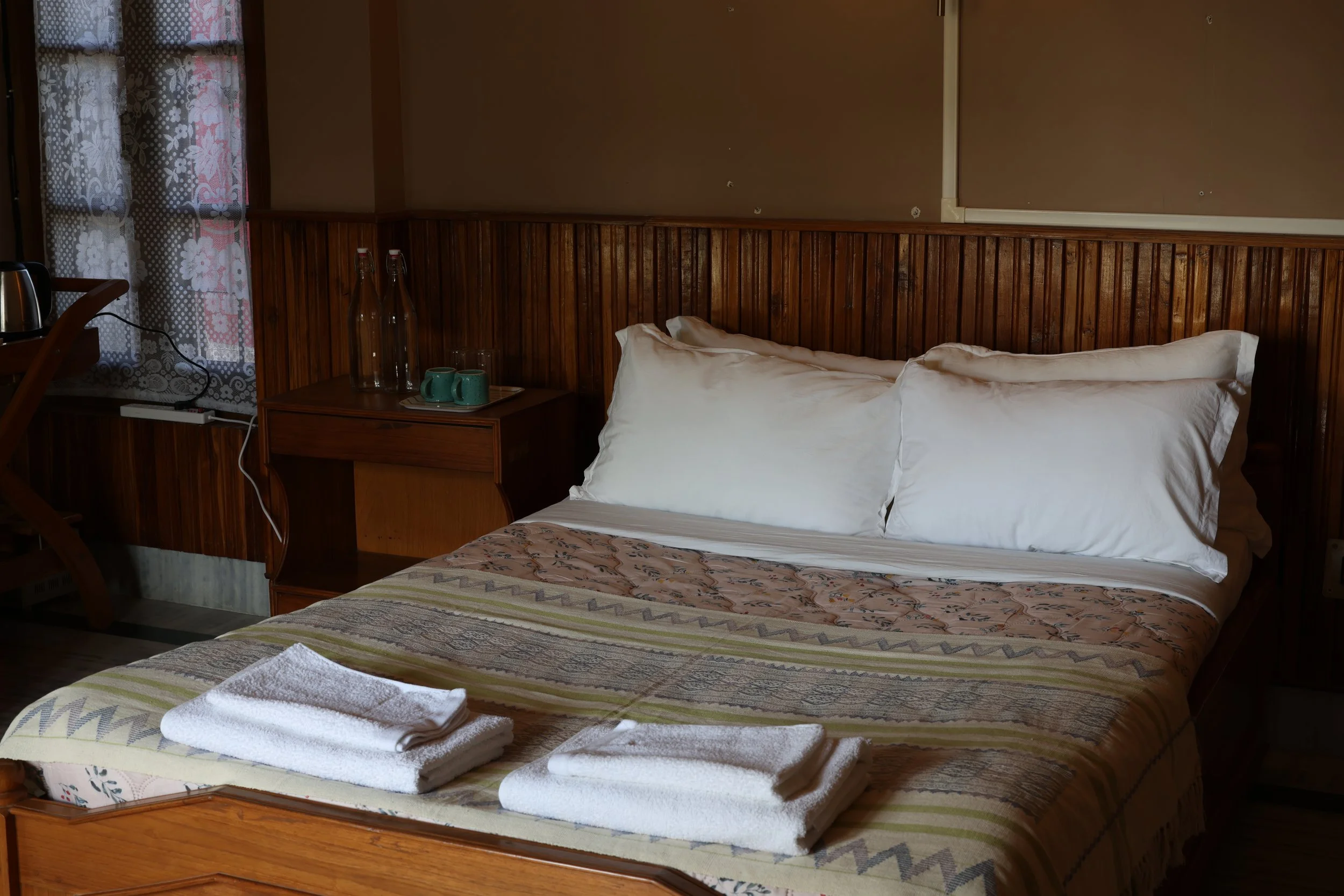 Twin Room. A spacious, naturally lit room with two single beds and a balcony overlooking 
the grounds. Includes an attached bathroom and plenty of room to settle in. Single or double occupancy.

Price: ₹2,800 per night