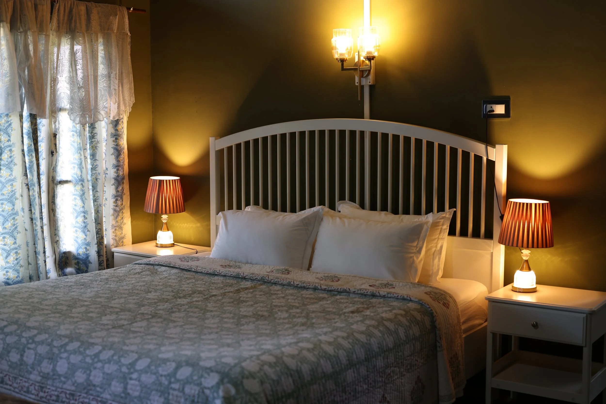 Deluxe Double Room 1. A spacious double room filled with natural light, with views across the leafy grounds and surrounding trees. Includes a comfortable double bed and private attached bathroom. Single or double occupancy.

Price: ₹3,000 per night