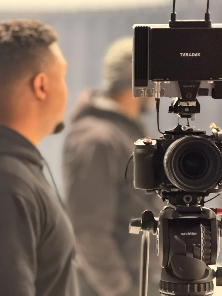 A cinema camera and crew working behind the scenes on a B3 Films production.