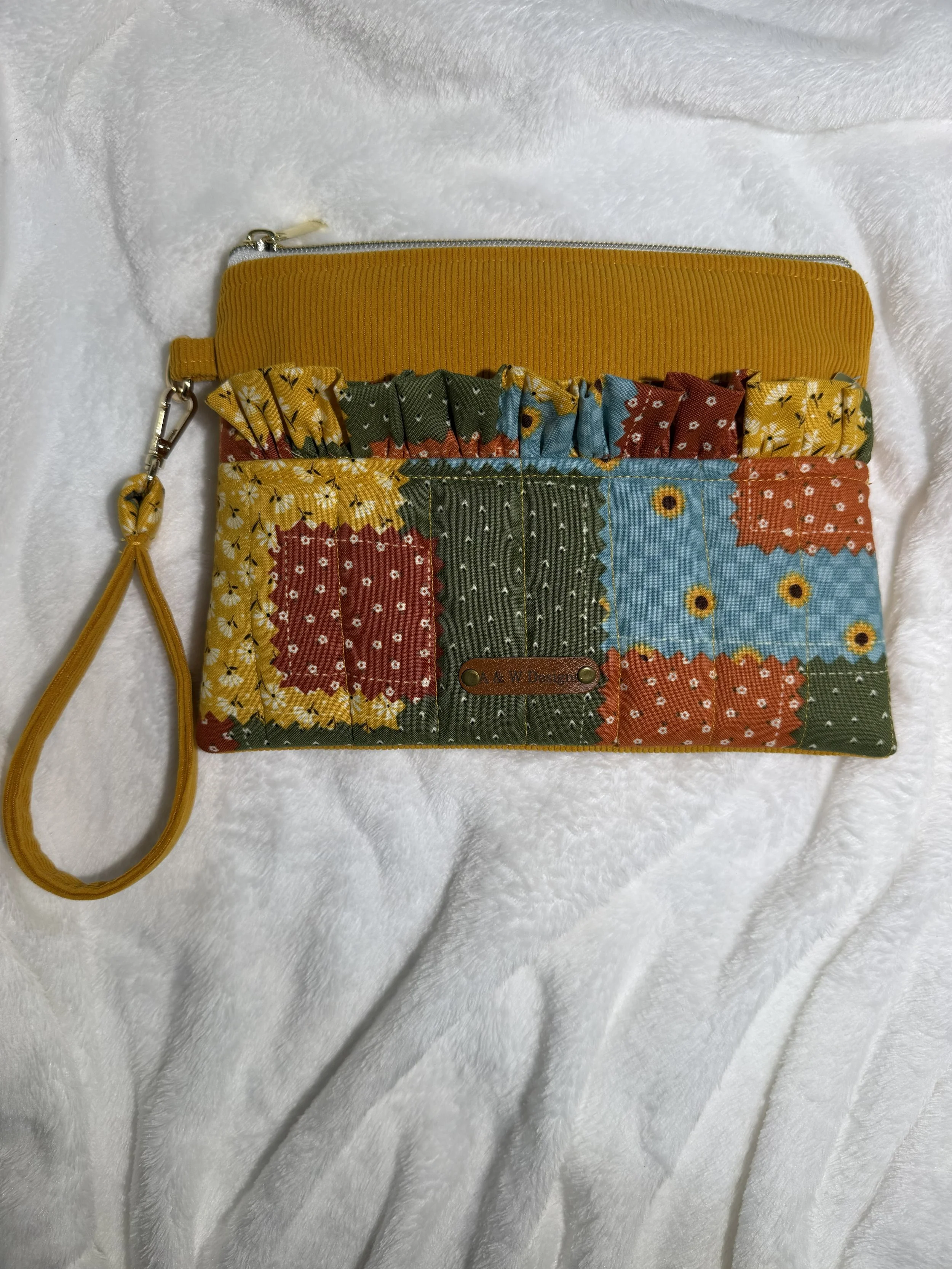 Mustard Patch Ruffle Wristlet