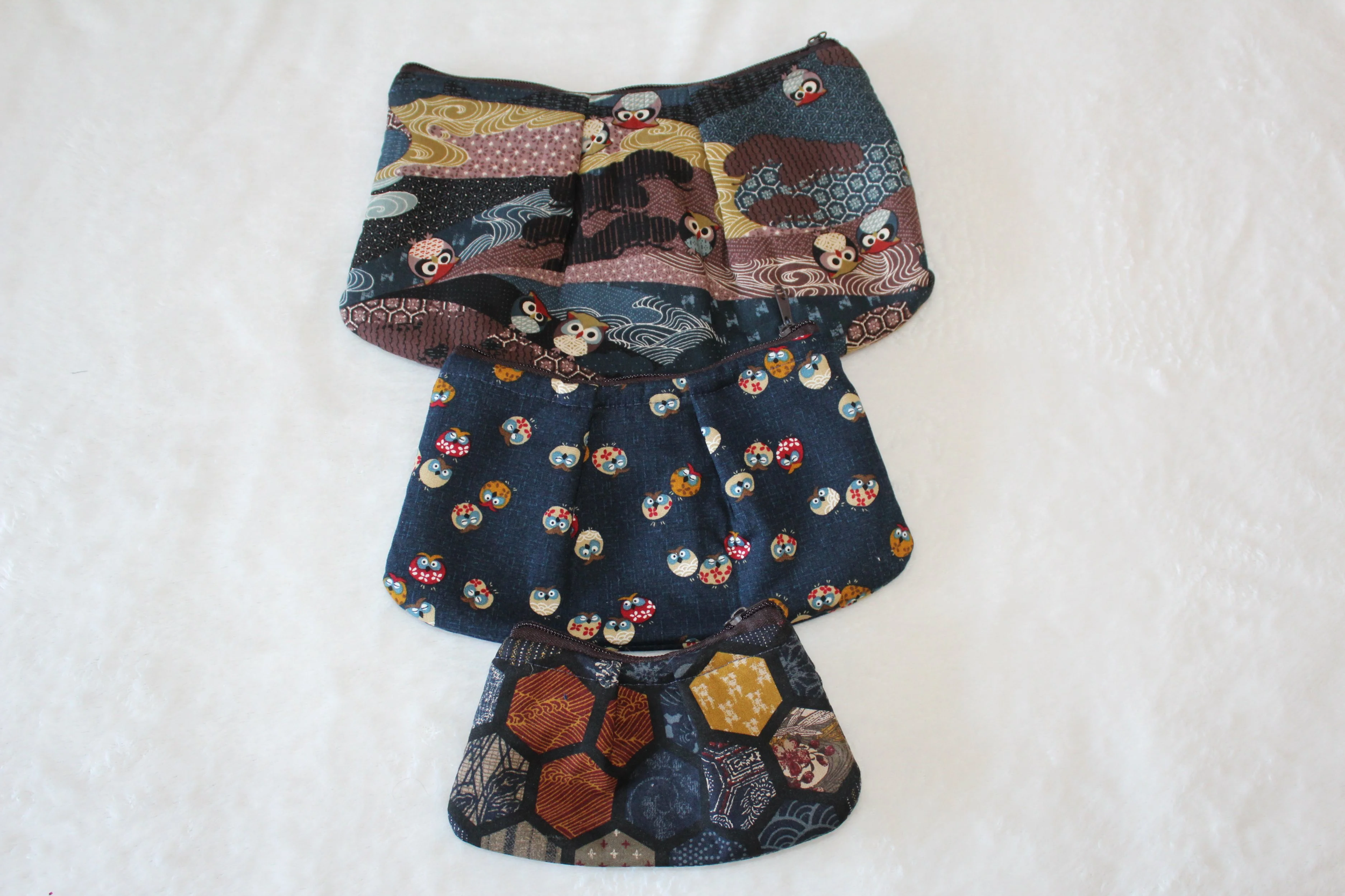 Darker Themed Oriental Pleated Pouches