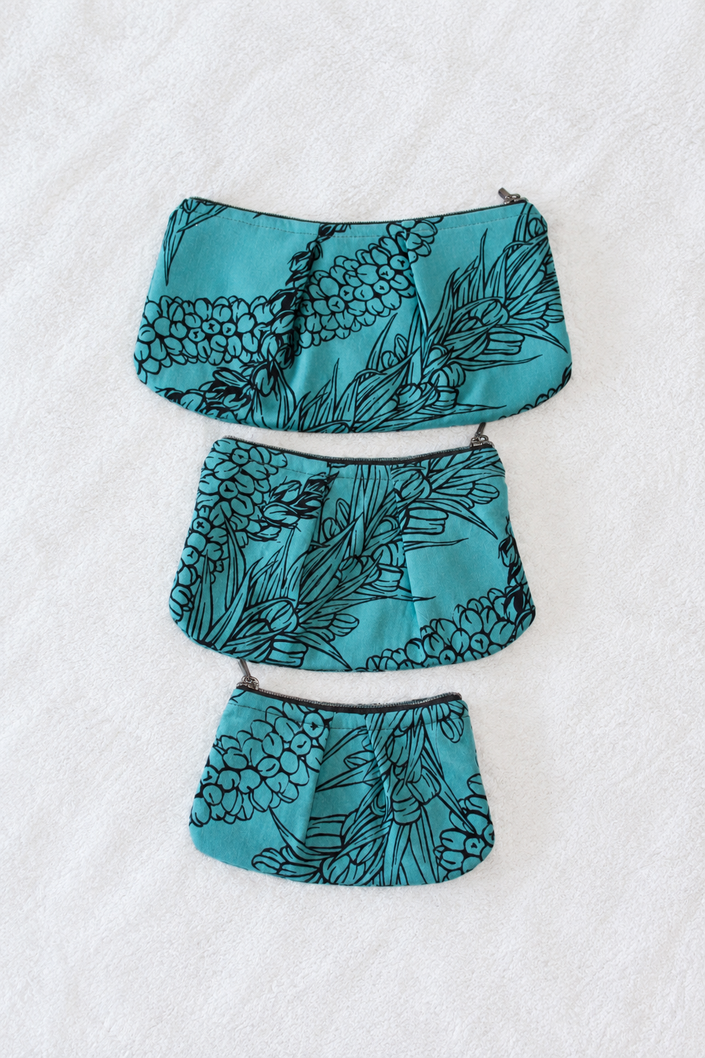 Teal Lauhala Pleated Pouches
