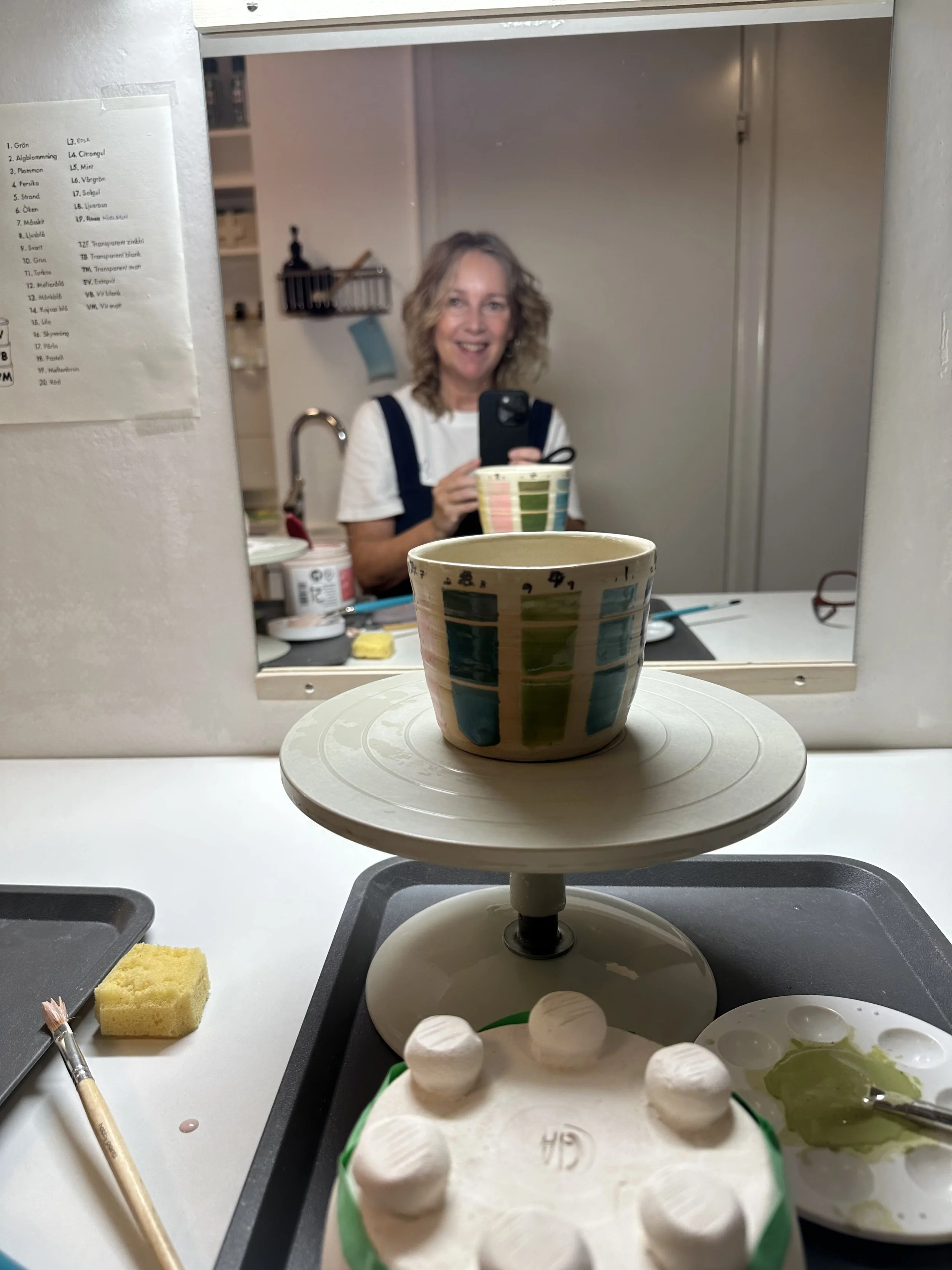At the Studio, testing glazes.