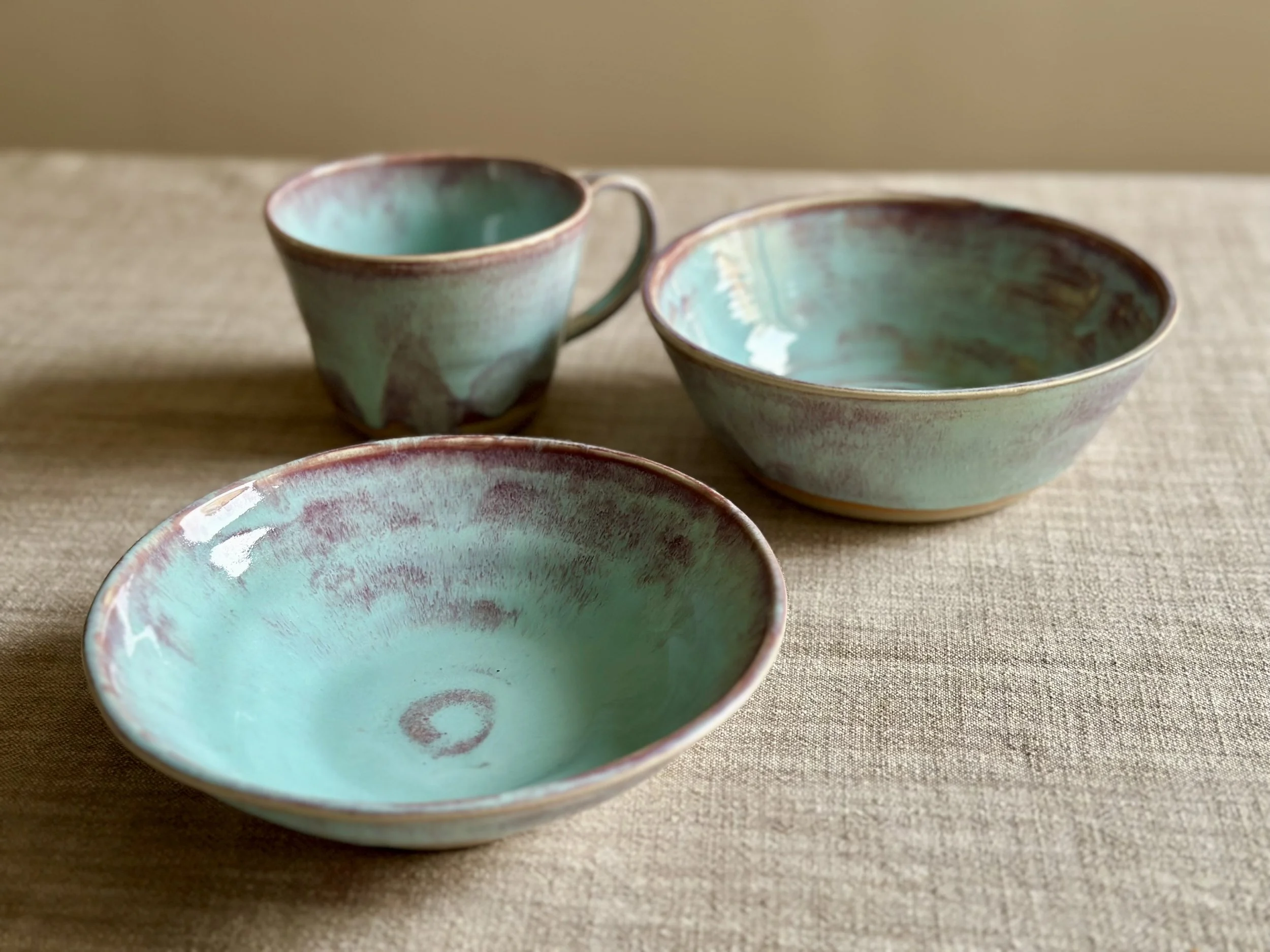 Trying out the "Blue Flame" glaze on a few bowls.