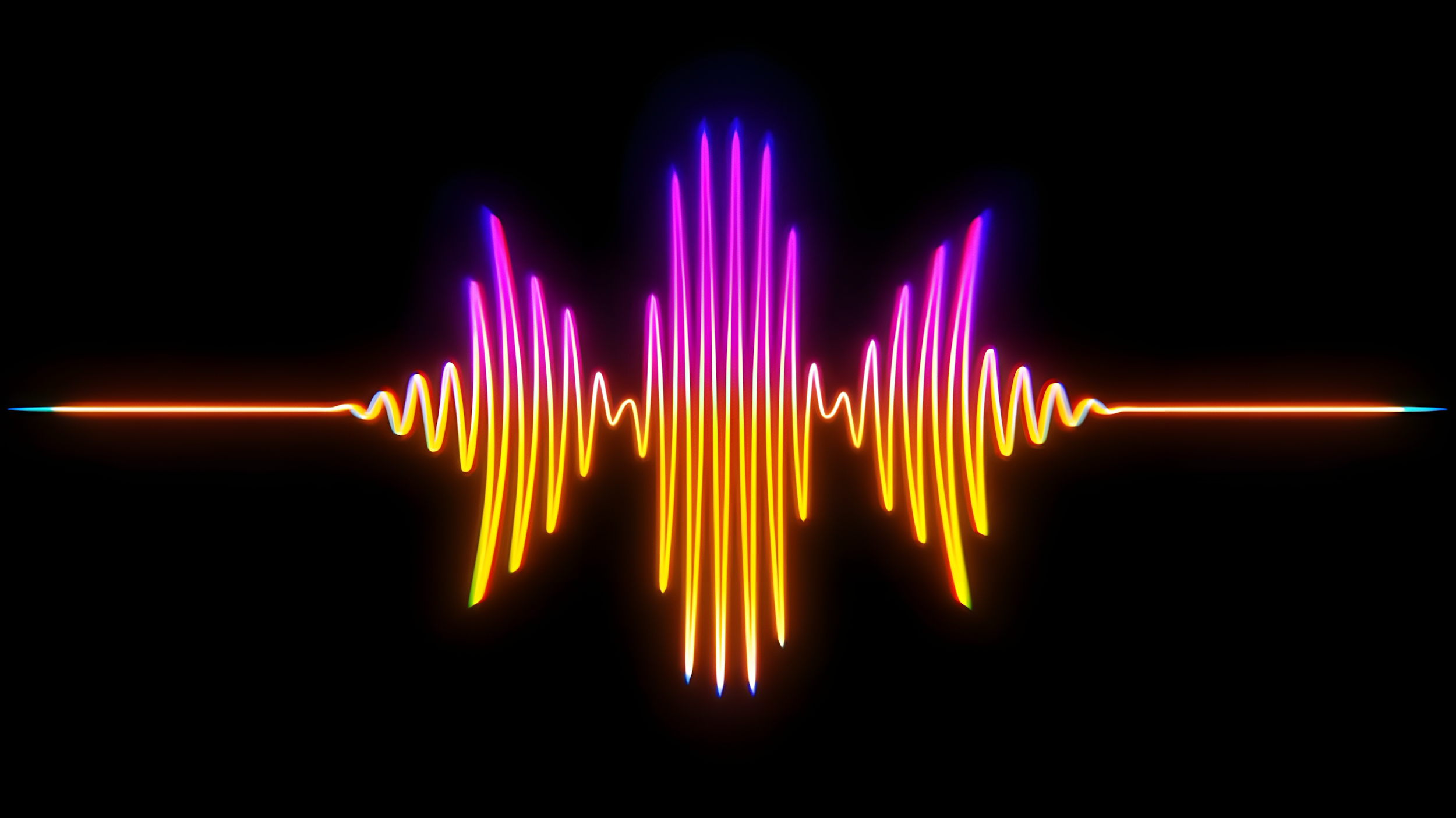 Colorful digital waveform with neon pink, purple, yellow, and orange lines on a black background.