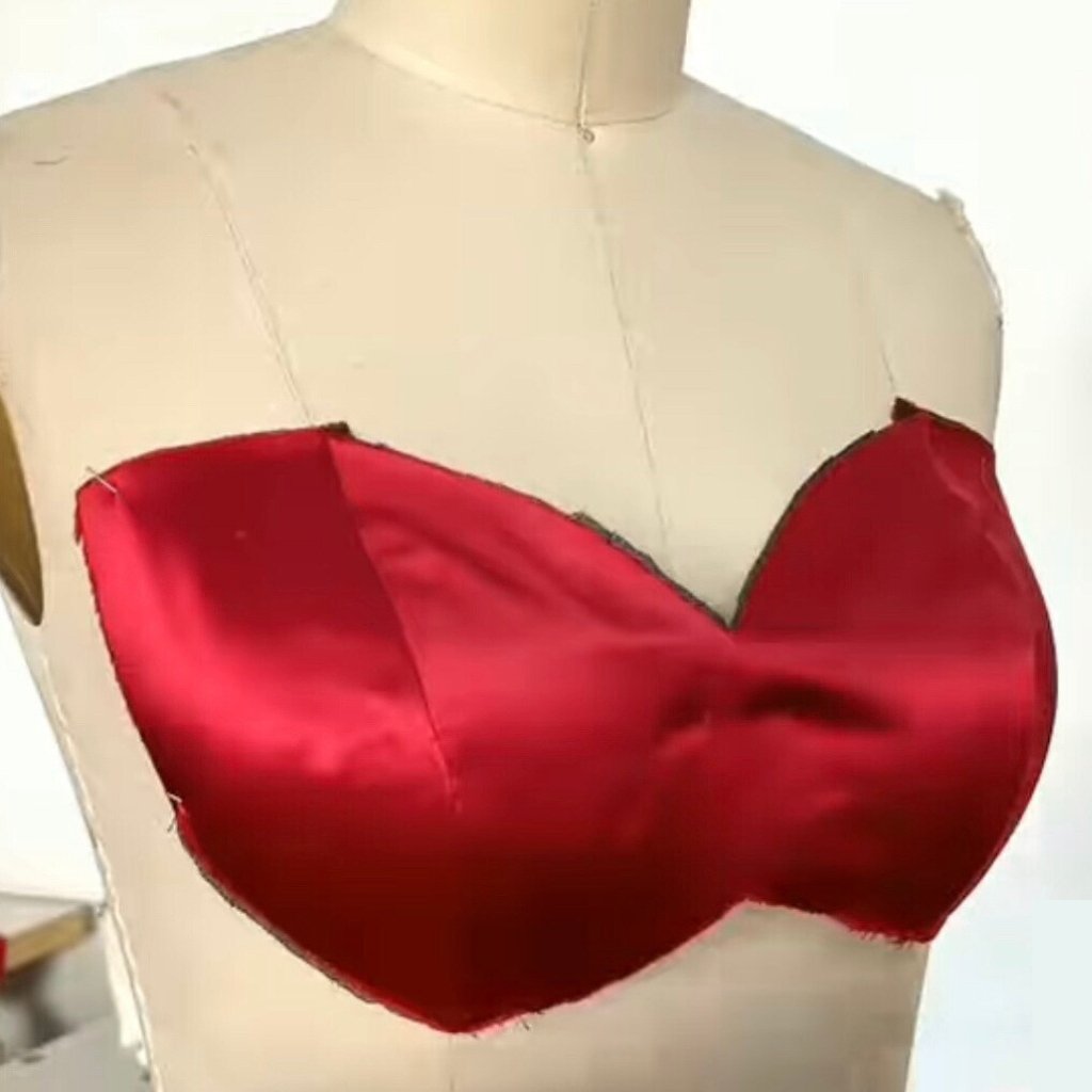 Corset in development on a dress form during the fitting and refinement process at Sheridonna Designs.