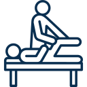 A person sitting on a bed.