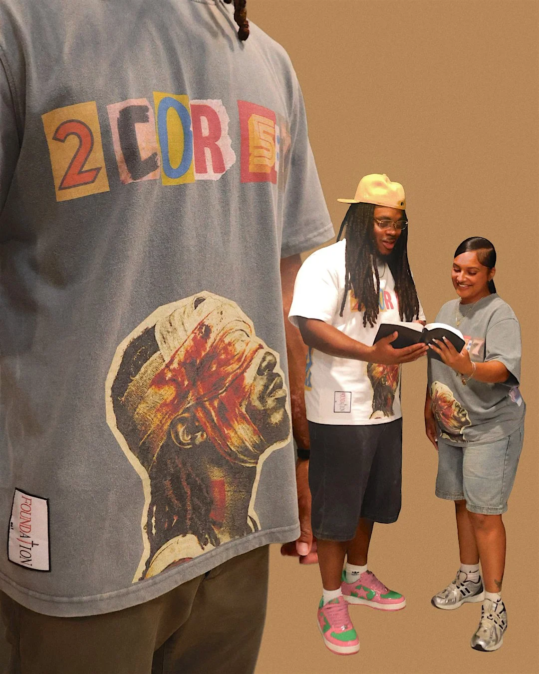 Two people are standing together, reading a book. The person on the left is wearing a white shirt with the '2 COR 5' logo, glasses, a beige cap, and colorful sneakers. The person on the right is wearing a gray shirt with the same logo, shorts, and sn
