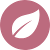 Close-up of a black leaf symbol inside a pink circular background.