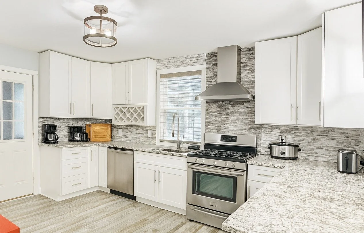 Renovated modern open concept kitchen in single-family rental home in Glen Burnie, Maryland