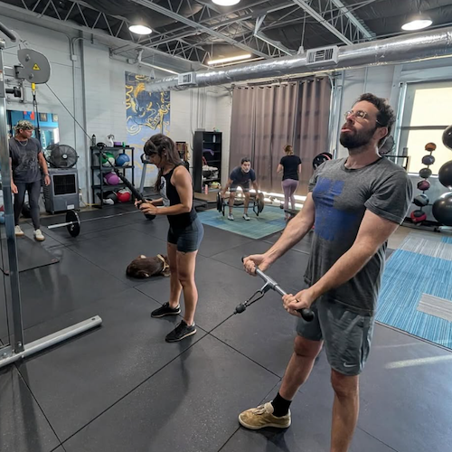 Couple working out together inside Blackbird's studio