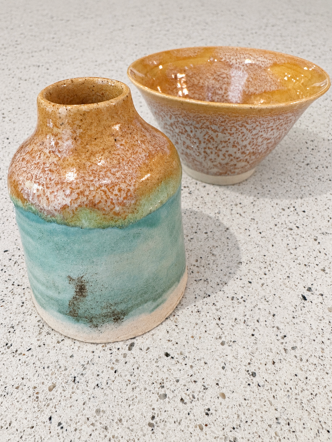 Vases and bowls with beige glazes