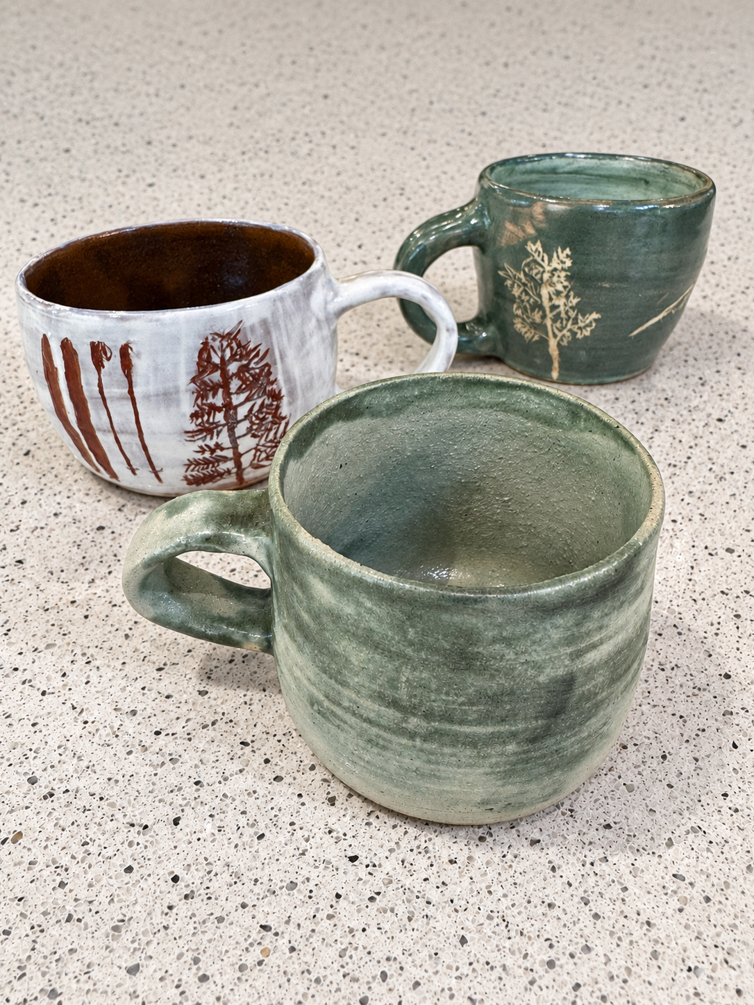 Various wheel thrown mugs