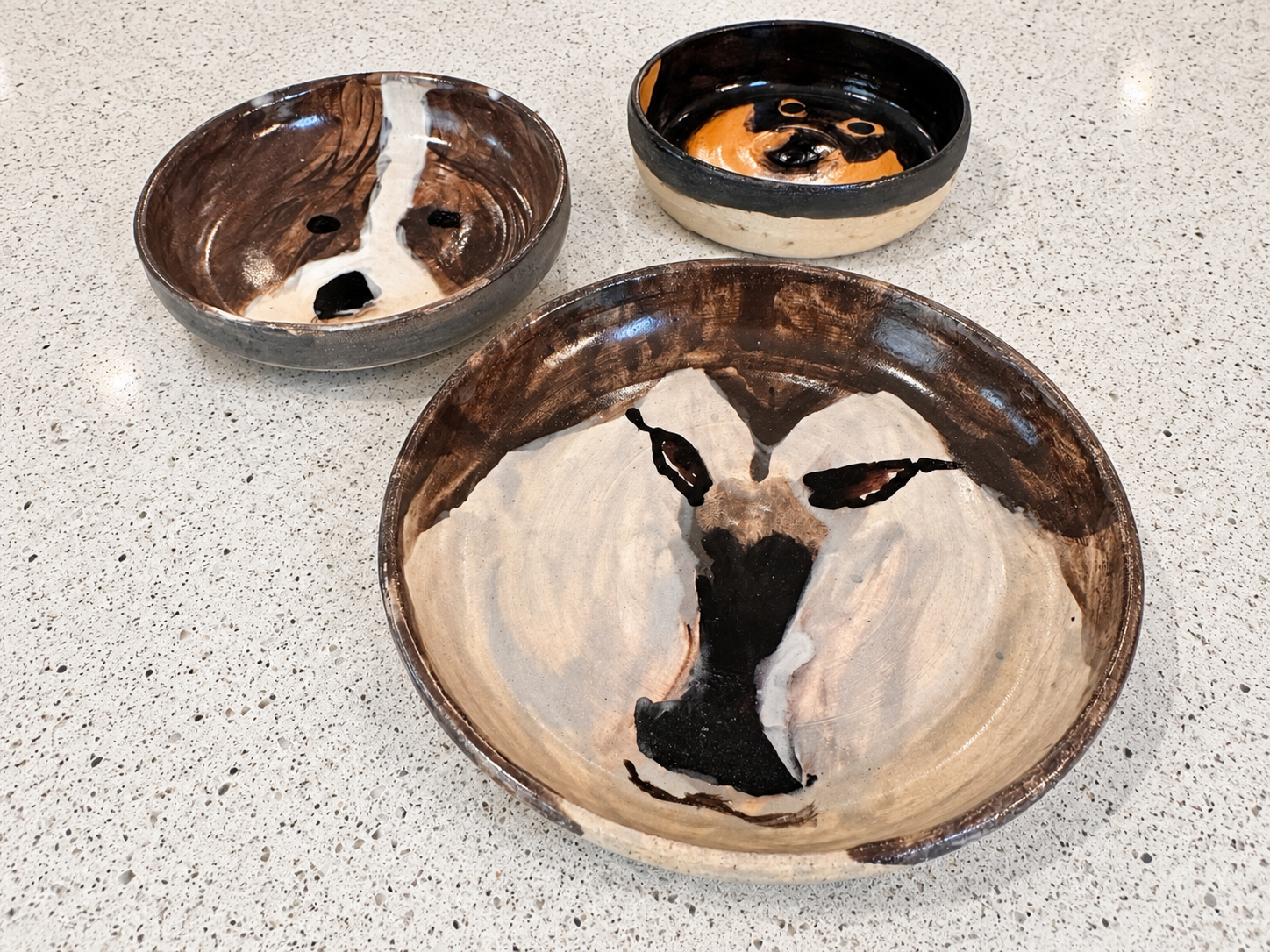 Wheel thrown dog bowls with hand painted glazes