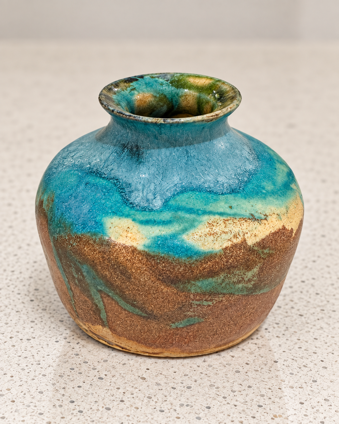 Wheel thrown vase with experimental glaze