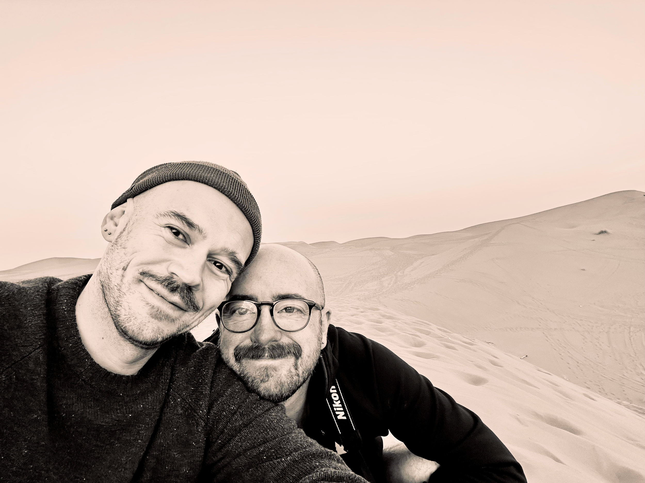 1. Michael and his husband Steven taking a selfie together in the dunes of the Moroccan Sahara.
