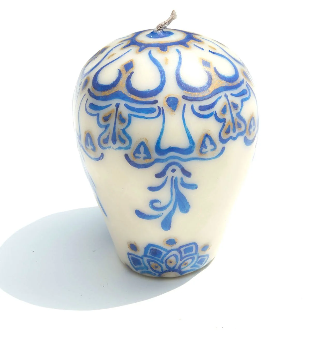 wax paraffin candle mexico artisan toluca hand dipped hand painted collaboration iconography aztec body painting puebla talavera pottery blue white floral burgundy pop art contemporary craft codex prehispanic mexchic