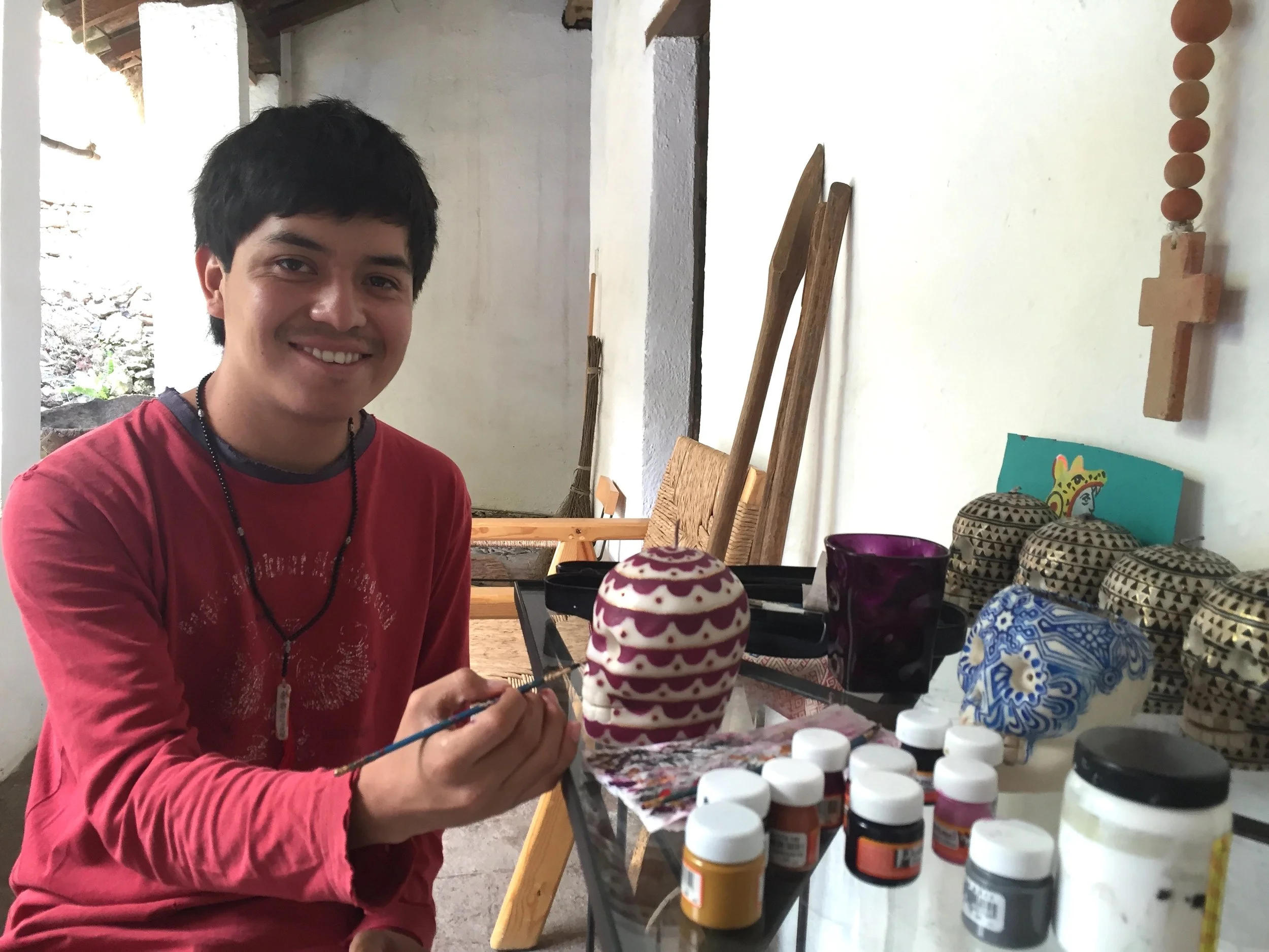 wax paraffin candle mexico artisan toluca hand dipped hand painted collaboration iconography aztec body painting puebla talavera pottery blue white floral burgundy pop art contemporary craft codex prehispanic mexchic israel hernandez painter
