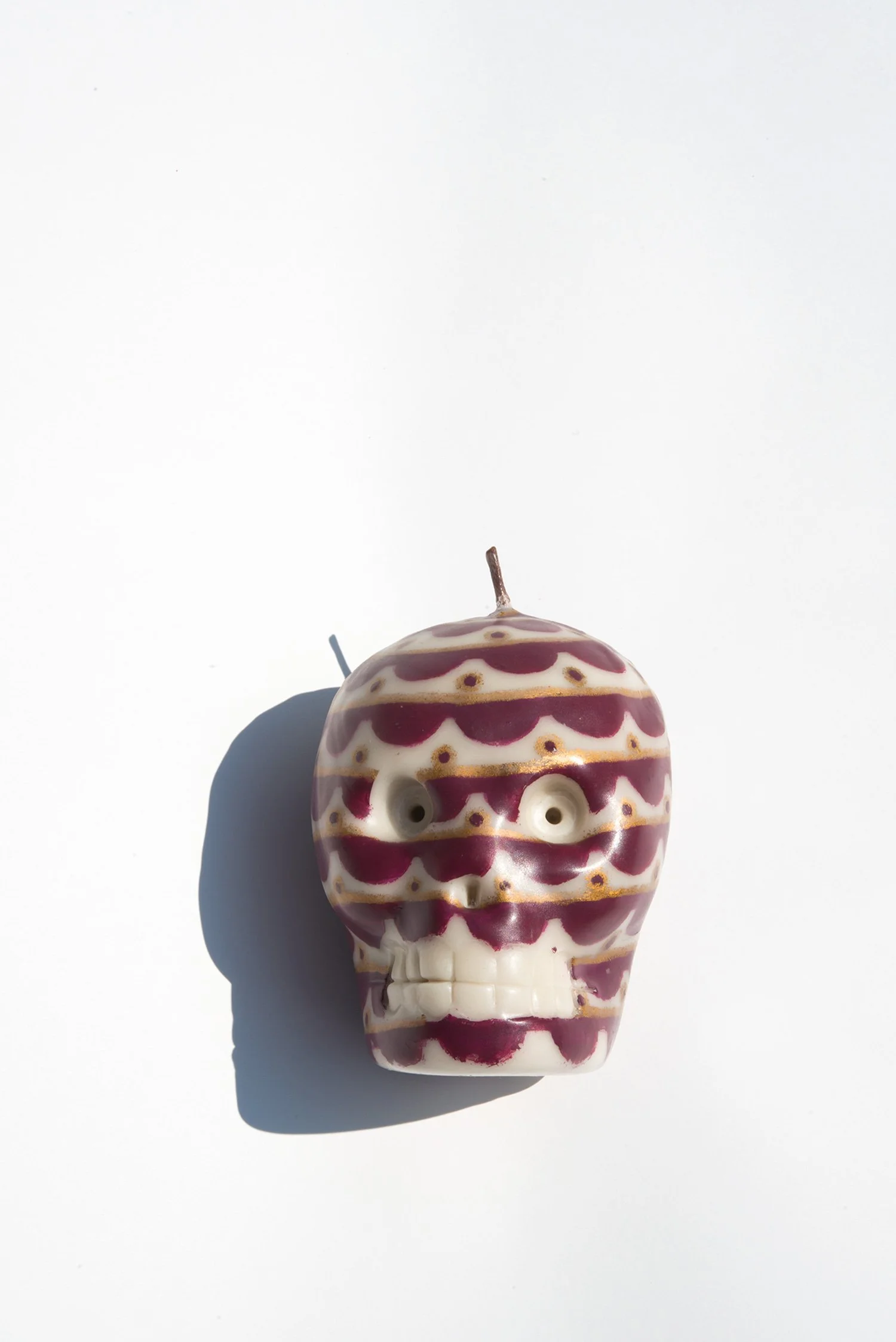 wax paraffin candle mexico artisan toluca hand dipped hand painted collaboration iconography aztec body painting puebla talavera pottery blue white floral burgundy pop art contemporary craft codex prehispanic mexchic
