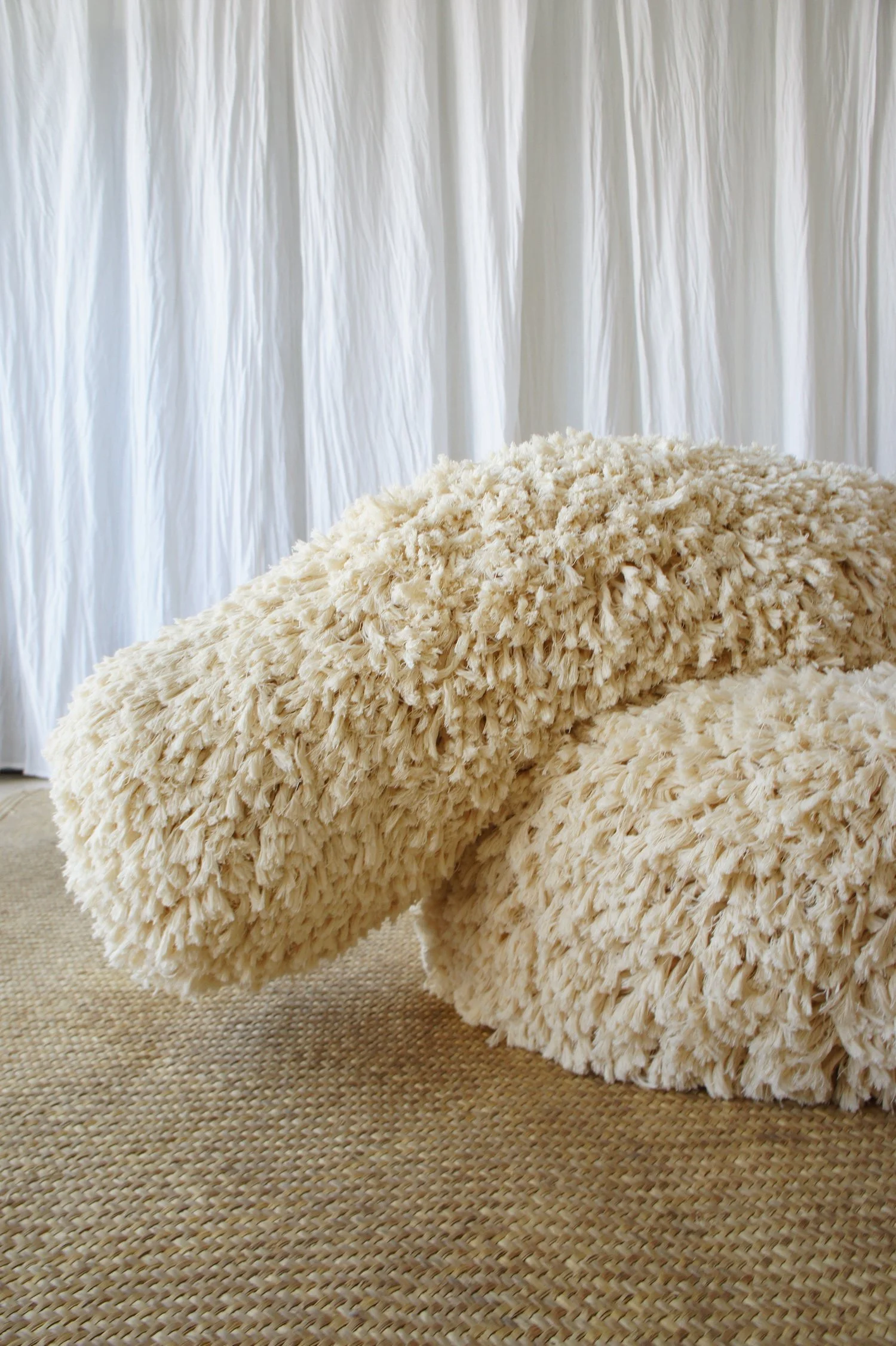 Mexchic Shag throw pillow, rug, jacket, purse texture handwoven in cream cotton, artisan made textile in Clothing craft shopping in Oaxaca Mexico. The Mexican textile is made with handwoven cotton made on a loom. Moroccan wedding blanket loops beddin