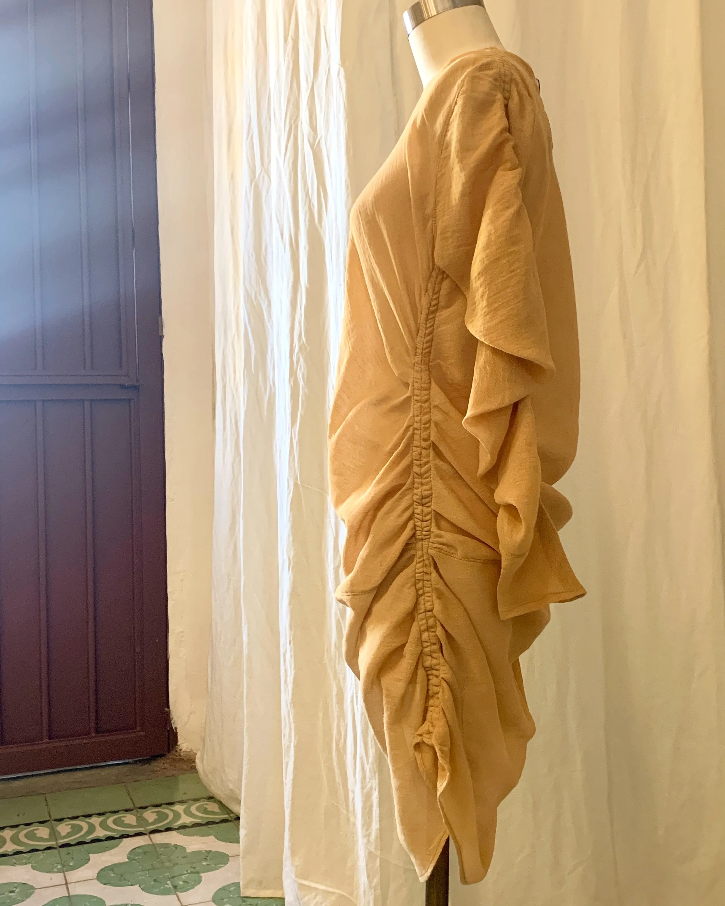 Mexchic clothing collection Anatomy shopping in Oaxaca, Mexico, simple, minimal, minimalist handmade with natural fabrics and fibers, ecological botanical dyes, regenerative cotton, and wool with Mexican artisans, weavers, spinners, red pottery baro 