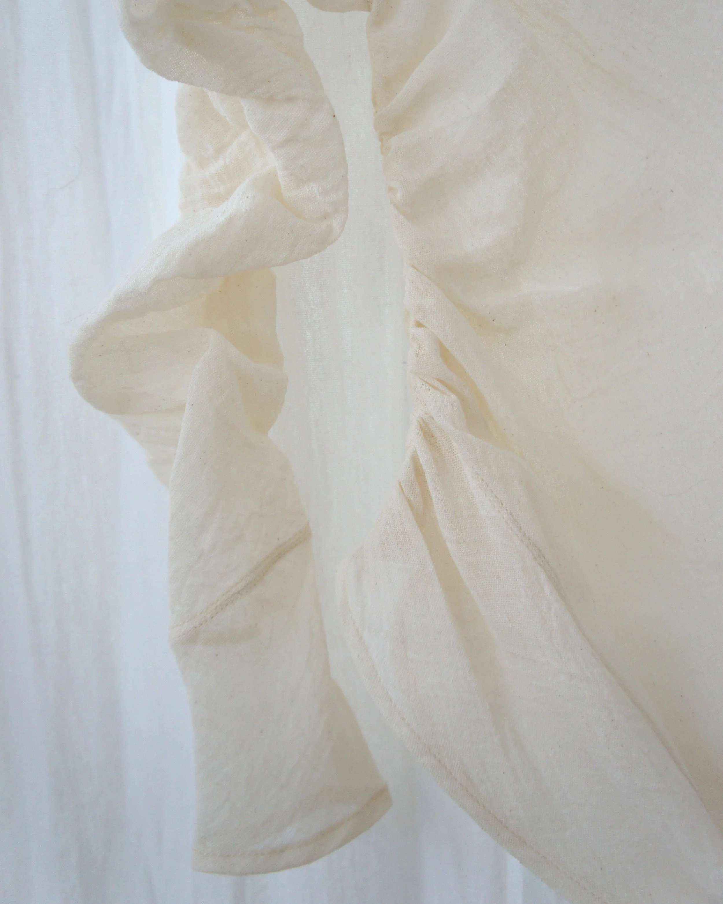 Mexchic clothing collection Anatomy shopping in Oaxaca, Mexico, simple, minimal, minimalist handmade with natural fabrics and fibers, ecological botanical dyes, regenerative cotton, and wool with Mexican artisans, weavers, spinners, red pottery baro 
