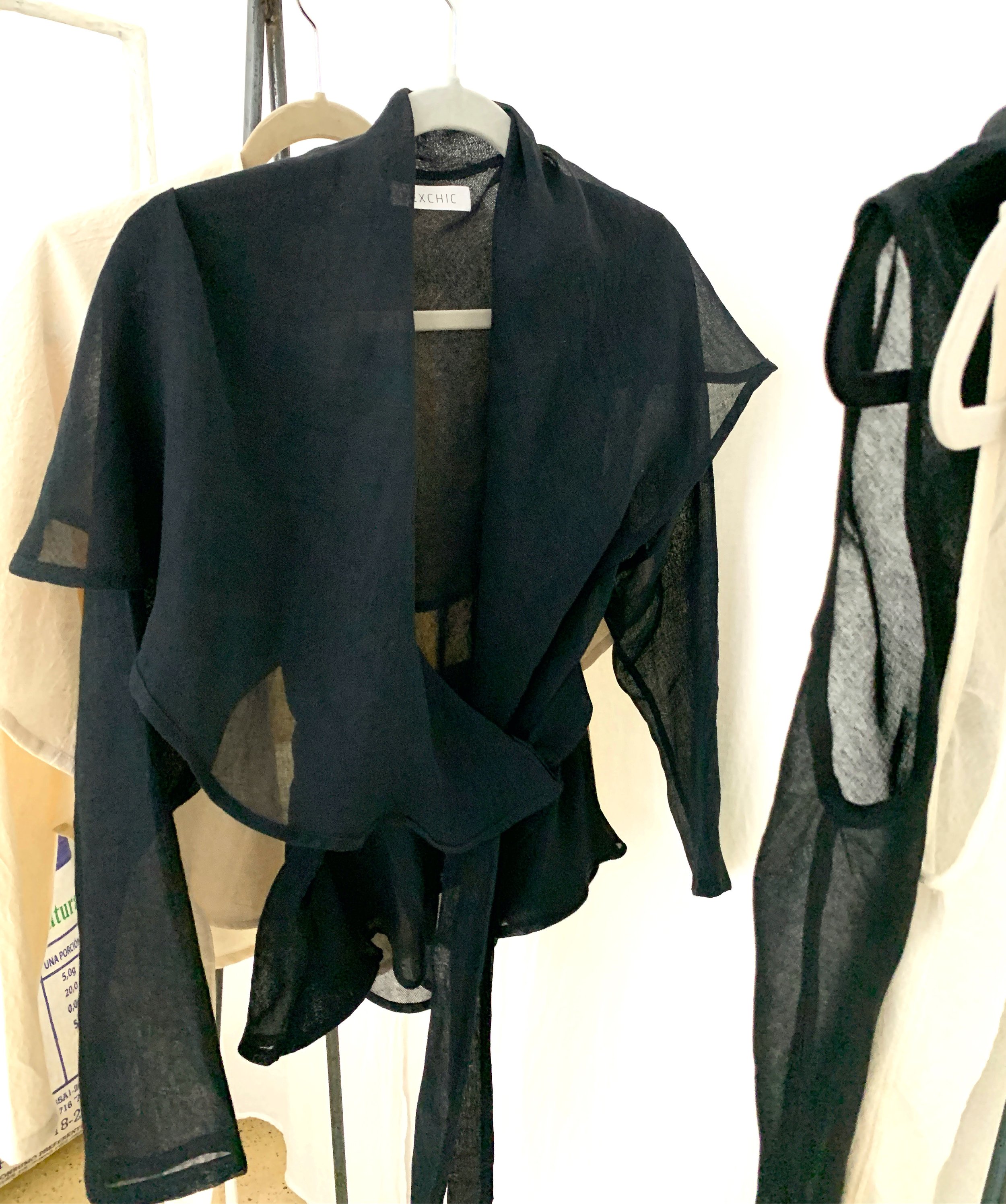 Mexchic clothing collection Anatomy shopping in Oaxaca, Mexico, simple, minimal, minimalist handmade with natural fabrics and fibers, ecological botanical dyes, regenerative cotton, and wool with Mexican artisans, weavers, spinners, red pottery baro 